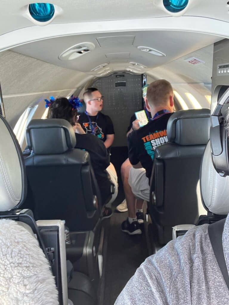 Special Olympics athletes from Columbus, MO on board a private flight with Plitek's CEO Karl Hoffman. 