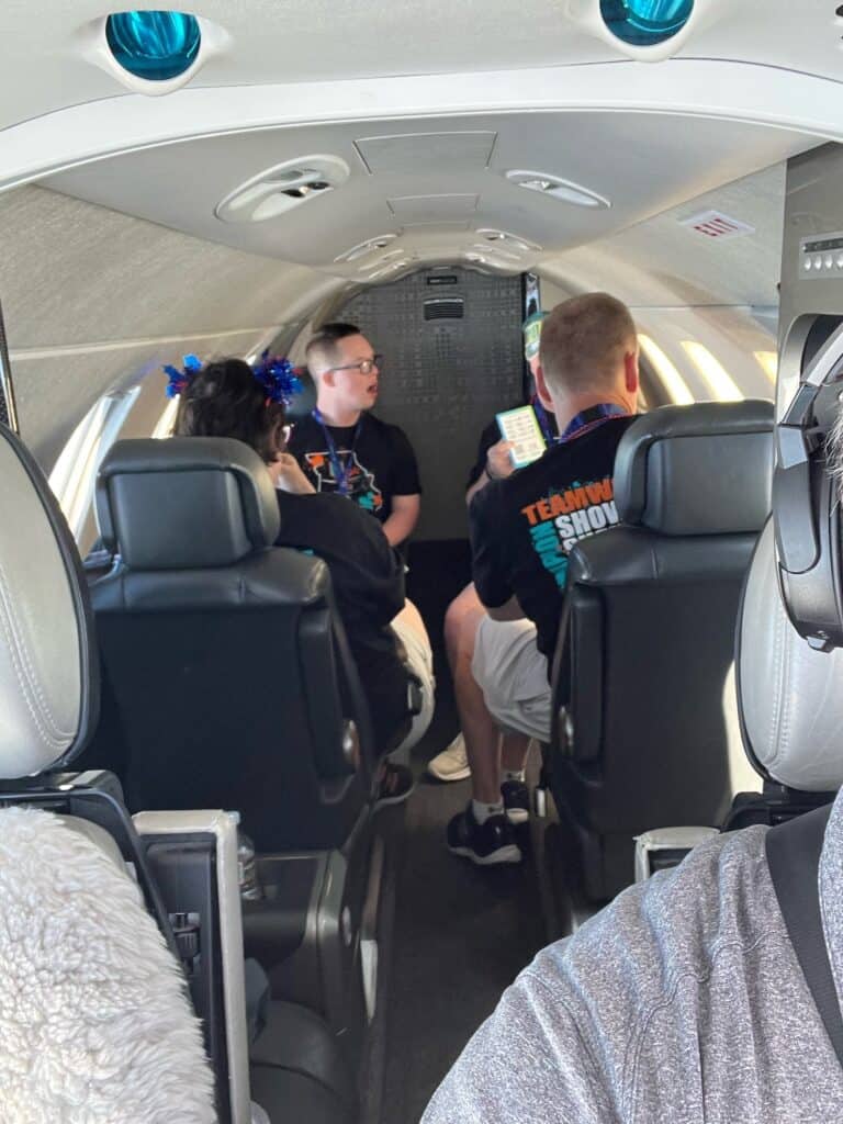 Special Olympics athletes from Columbus, MO on board a private flight with Plitek's CEO Karl Hoffman.